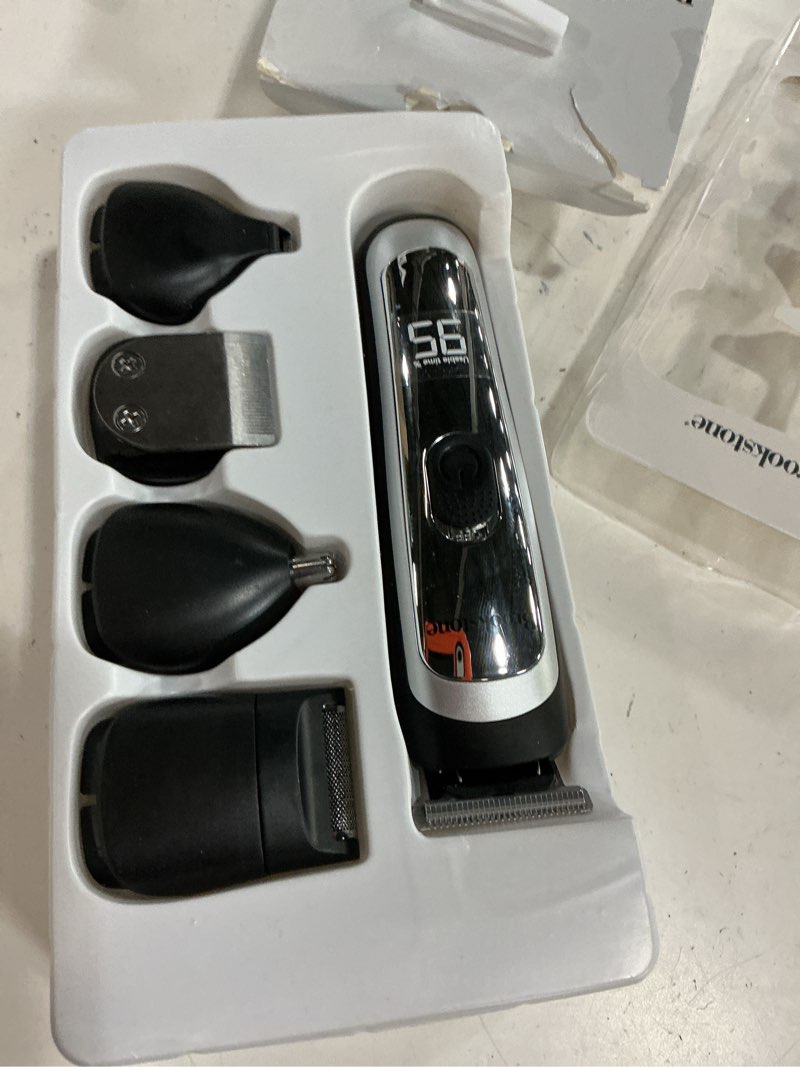 Condition photo showing Good Condition for brookstone - hair & beard trimmer kit, precision grooming for hair, beard, & body with adjustable combs, charging base & accessories (14-piece)