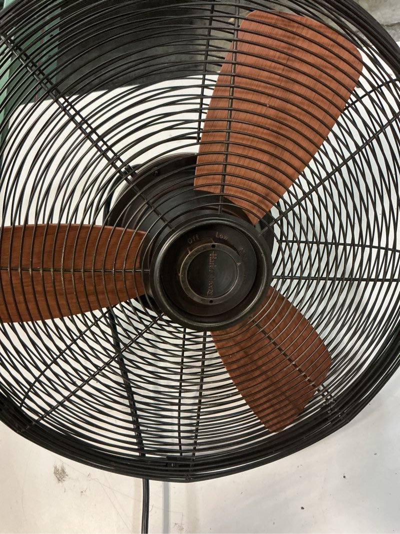 Condition photo showing As Is for harbor breeze marina cove 18-in plug in oscillation indoor or outdoor bronze wall