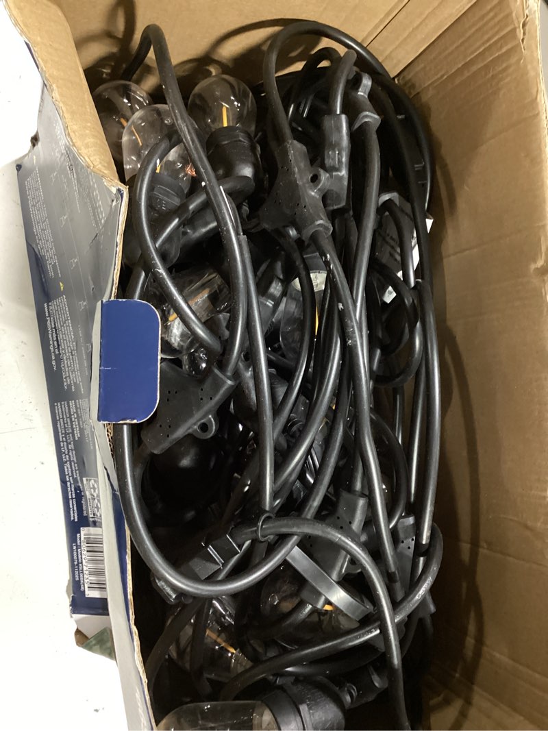 Condition photo showing As Is for harbor breeze 96-ft plug-in black indoor/outdoor string light with 48 white -light led edison bulbs