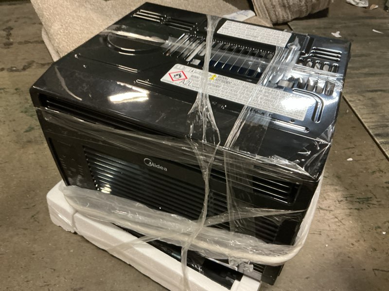 Condition photo showing As Is for midea 6,000 btu 115v window air conditioner with comfort sense remote, up to 250 sq. ft., black, maw06r1wbl-t, new