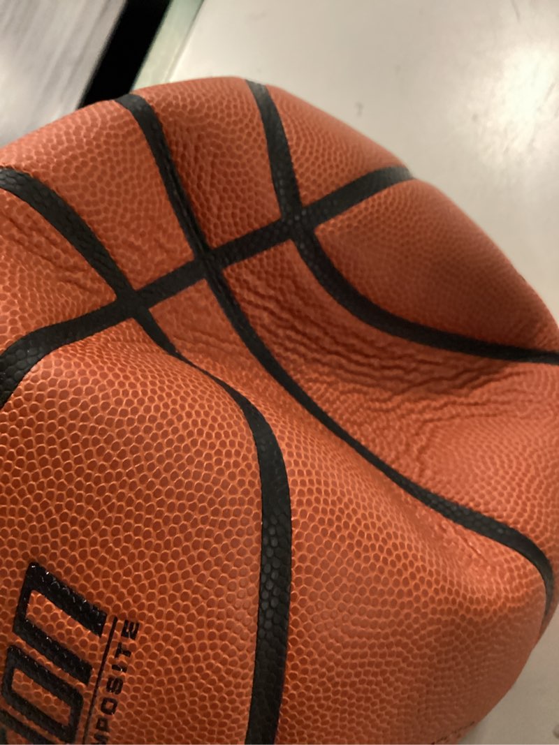 Condition photo showing As Is for wilson evolution basketballs brown - game ball size 6 - 28.5"