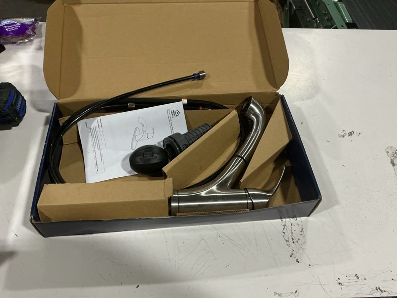Condition photo showing As Is for project source everfield stainless steel single handle deck-mount pull-out kitchen faucet with sprayer (includes deck plate)