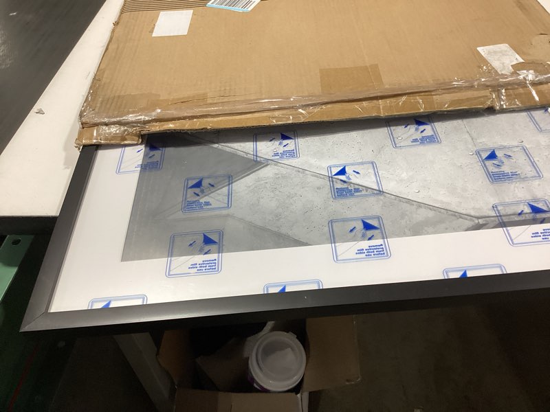 Condition photo showing Good Condition for americanflat 22x28 poster frame with polished plexiglass - use as 18x24 frame with mat or display 22x28 photo without mat - streamline collection - thin border picture frames for wall - black black 22x28 1 pack