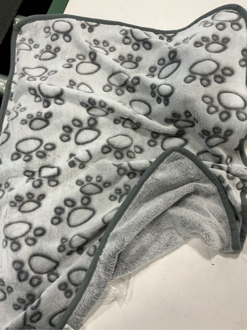 Condition photo showing As Is for 2 Pcs Large Self Warming Cat Pad Self Heating Cat Mat Bed Dog Crate Pet Blankets Thermal Heated Bed Mat for Outdoor Indoor Newborn Kittens Puppies Dog(Paw Print,24 x 18) Paw Print 24 x 18
