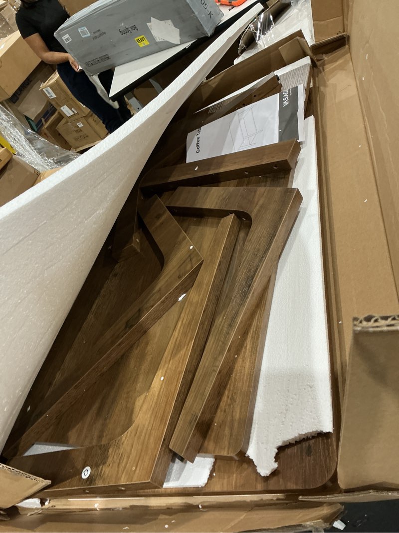 Condition photo showing As Is for vasagle maezo collection - coffee table, 2-tier center table with storage, tapered legs, curved transitions, 21.7 x 39.4 x 17.7 inches, easy to assemble, for living room, honey brown ulct249k01