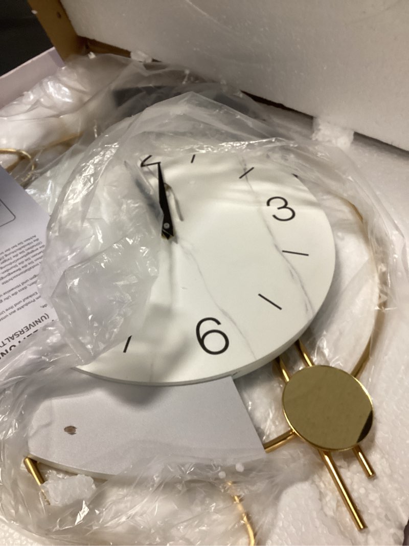 Condition photo showing Good Condition for Dankeit Wall Clock, Silent Quality Quartz Battery Operated with Pendulum, Large Wall Clock for Living Room, Kitchen, Home, Bathroom, Bedroom Wall Decor,16x26.5inch(Golden) Golden 16x26.5inch