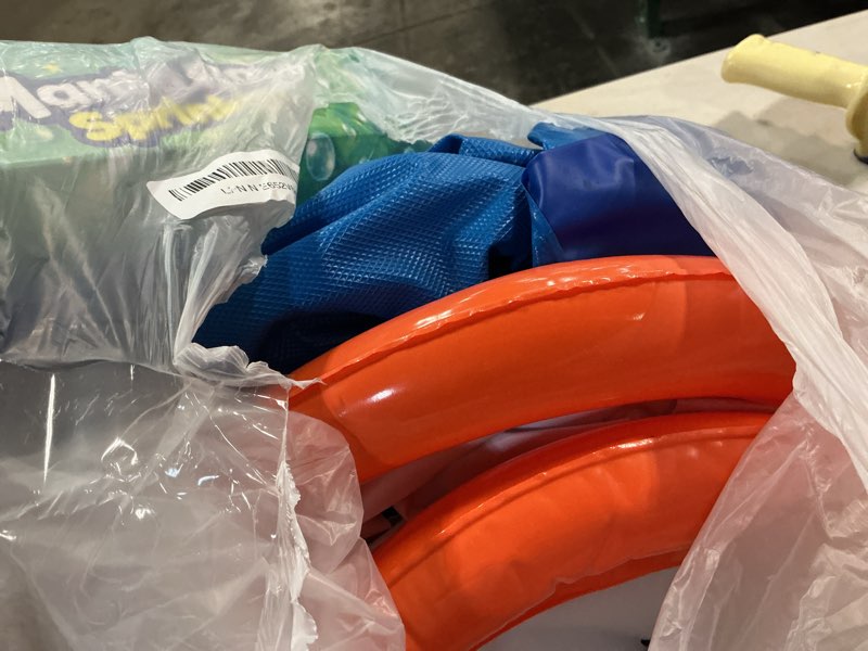 Condition photo showing As Is for sprinkler splash pad for kids: manta ray sprinkler with basketball hoop, inflatable water play mat, outdoor water toys for backyard summer play, for toddlers and kids ages 1-3, 4-8, 8-12