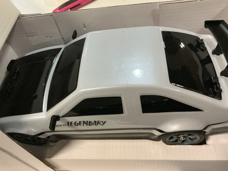 Condition photo showing Good Condition for SANCO 1:16 RC Drift Car with LED Lights & Spray, 2.4GHz Remote Control Car, Includes 2 Batteries & 2 Sets of Tires for Racing & Drifting, Electric Hobby Toy for Adults, Boys & Kids(Red) White