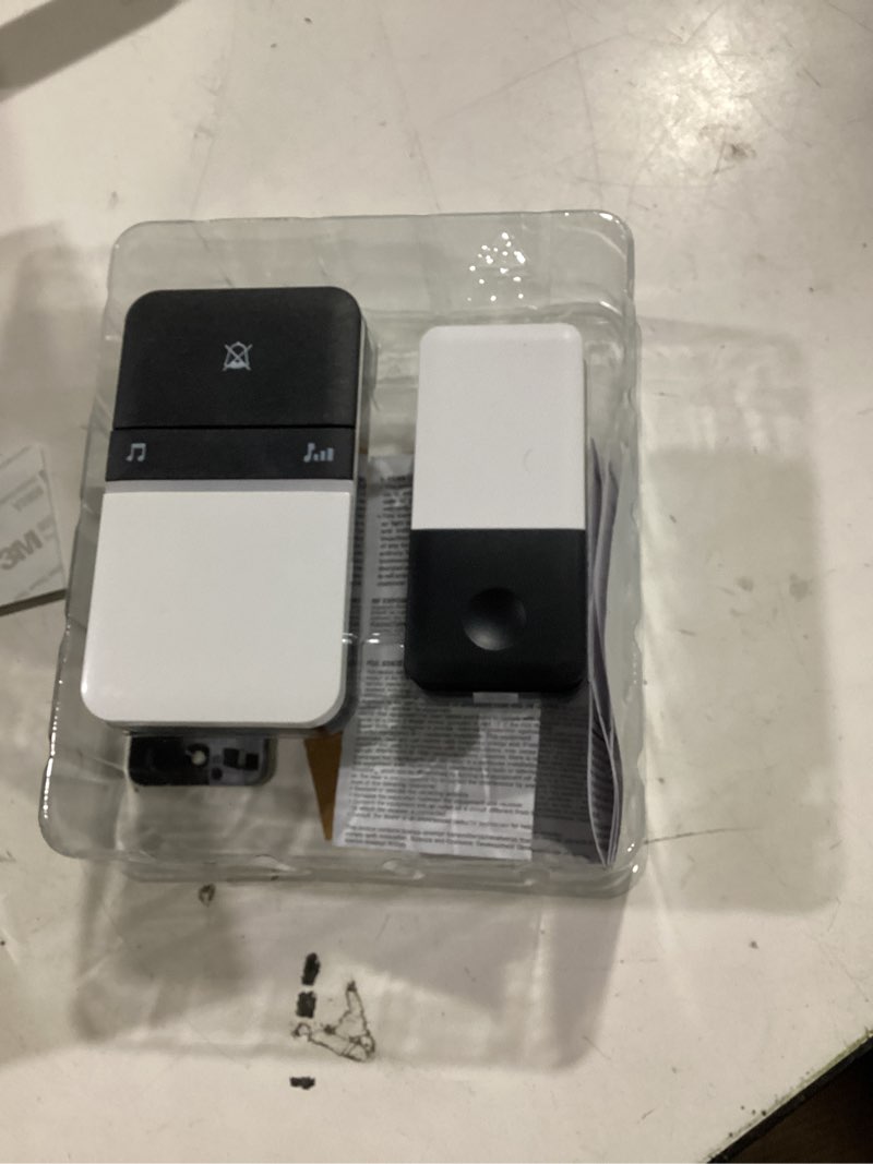 Condition photo showing As Is for Heath Zenith Wireless Lighted White/Black Doorbell Button