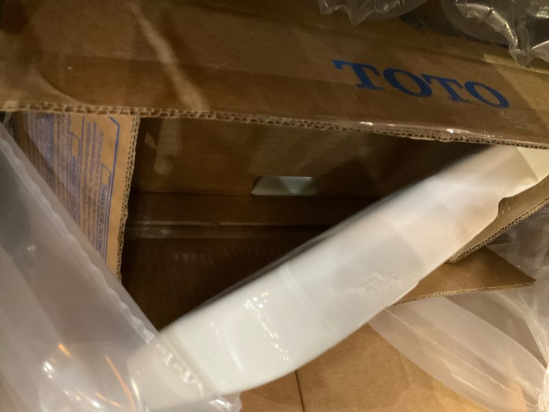 Condition photo showing As Is for toto drake two-piece elongated 1.6 gpf universal height tornado flush toilet with cefiontect, cotton white - cst776csfg#01