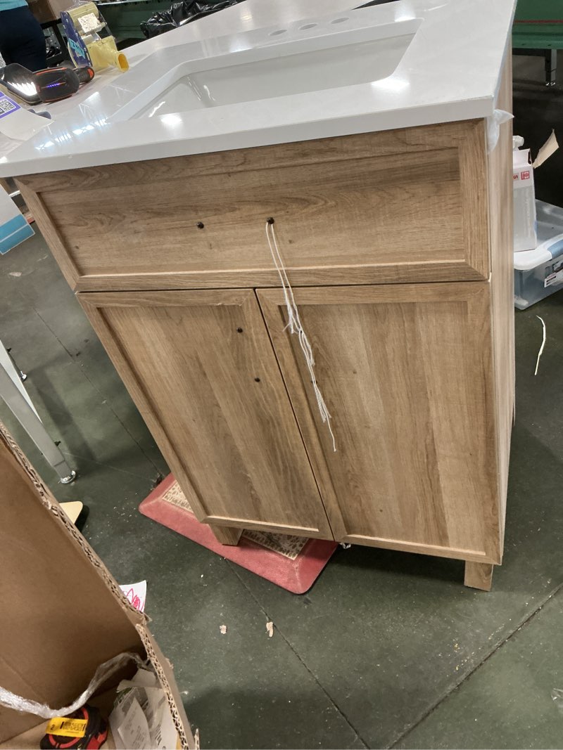 Condition photo showing As Is for (Broken pad)100+ bought last week Style Selections Dolton 24-in Light Natural Oak Undermount Single Sink Bathroom Vanity with