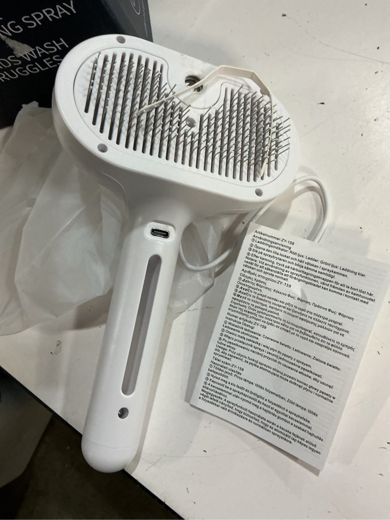 Condition photo showing As Is for 3-in-1 Self-Cleaning Steamy Pet Brush for Dogs & Cats, Fresh Fur Shower Brush That Removes Loose Hair, Reduces Shedding, Grooming Tool for Long & Short Hair, Wet or Dry Use (White)