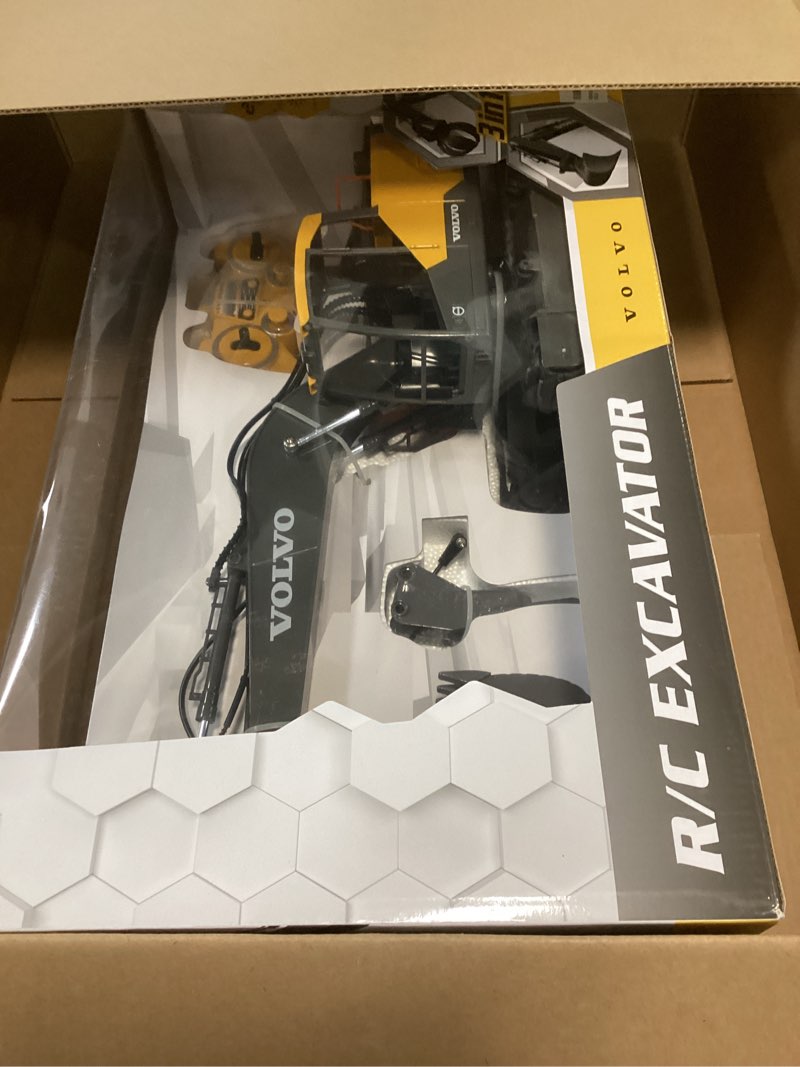 Condition photo showing Good Condition for DOUBLE E Volvo RC Excavator 17 Channel 3 in 1 Construction Toys, 17 Channel Remote Control Vehicles Tractor Sandbox Toys Digger with Metal Shovel Drill Grab RC Truck for Kids Adults