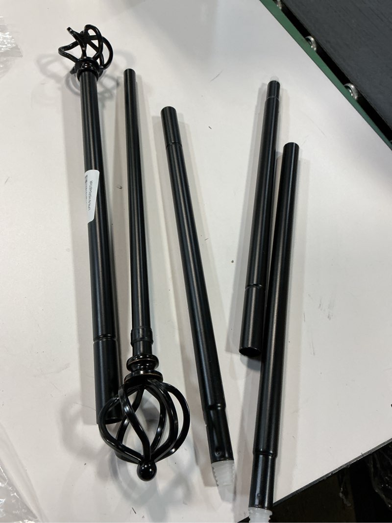 Condition photo showing As Is for KAMANINA Black Curtain Rod 32 to 58 Inch(2.6-4.8ft), Adjustable Curtain Rods for Windows 28 to 48 Inch, 3/4 Inch Splicing Drapery Rods with Twisted Cage Finial Black 32-58"