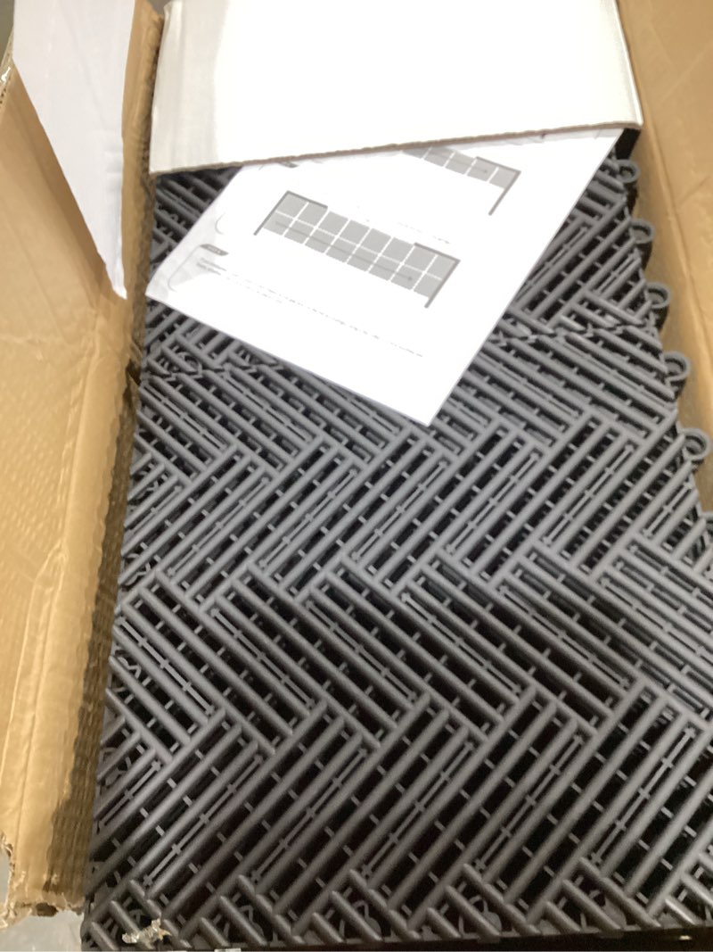 Condition photo showing Good Condition for garage floor tiles interlocking garage flooring tiles pack of 48 antislip oil and stain resistant for garages shop floors basements 40000 lbs load capacity (black, 12 inch x 12 inch, drain tiles) black 12 inch x 12 inch drain tiles