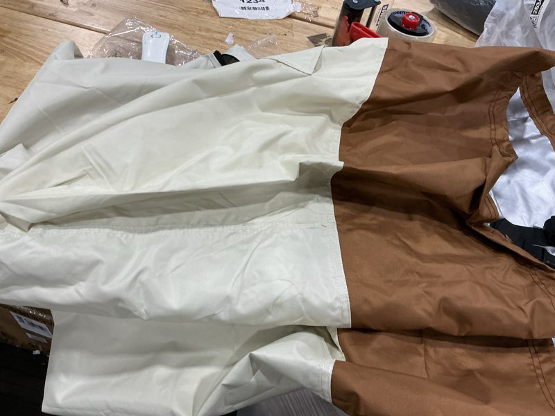 Condition photo showing Good Condition for jinhrtoyi patio coffee table cover,42wx26dx16h inches 100% waterproof heavy duty outdoor rectangular side table cover,beige&brown modern style outdoor furniture covers beige&brown-#6e3d2c&#f1e5de 42"wx26"dx16"h-oblong