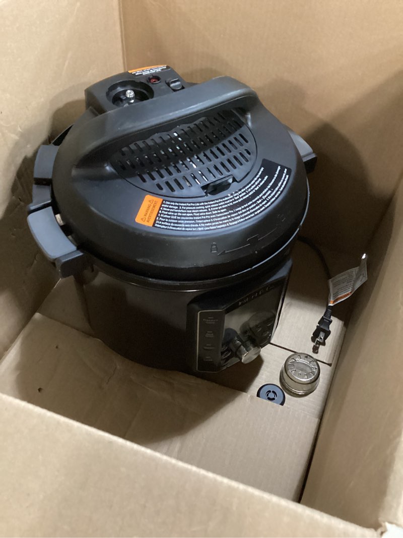 Condition photo showing As Is for instant pot pro 10-in-1 pressure cooker, slow cooker, rice/grain cooker, steamer, sauté, sous vide, yogurt maker, sterilizer, and warmer, includes app with over 800 recipes, black, 6 quart 6 quarts
