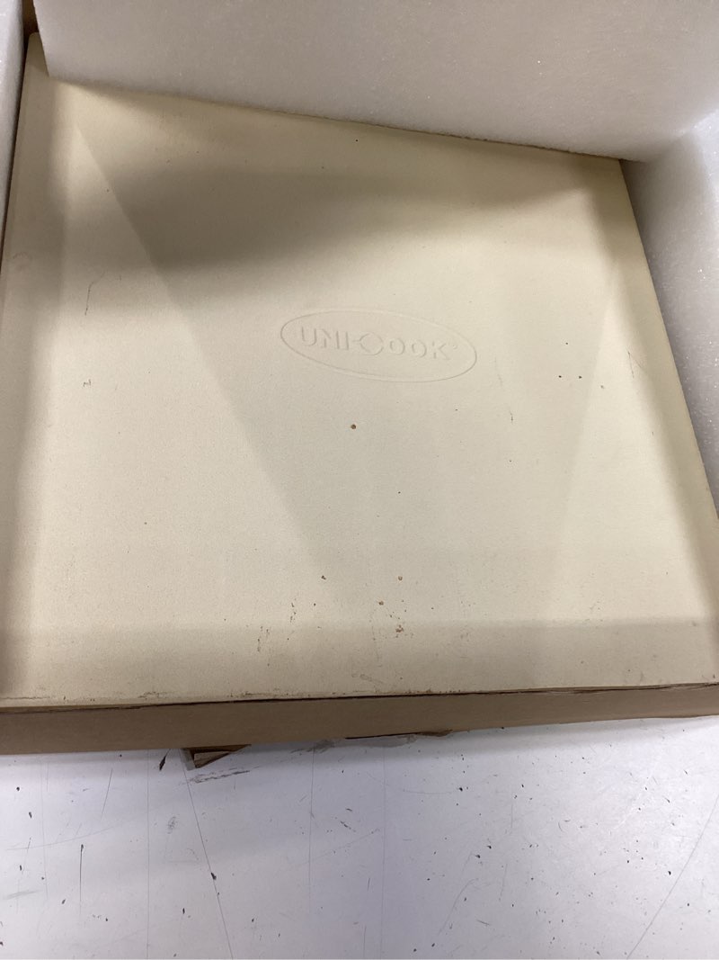 Condition photo showing As Is for unicook pizza stone for oven and bbq grill, 13 inch square baking stone for bread, cordierite thermal shock resistant pizza making accessory for oven and grill, including dough scraper 13" x 13"