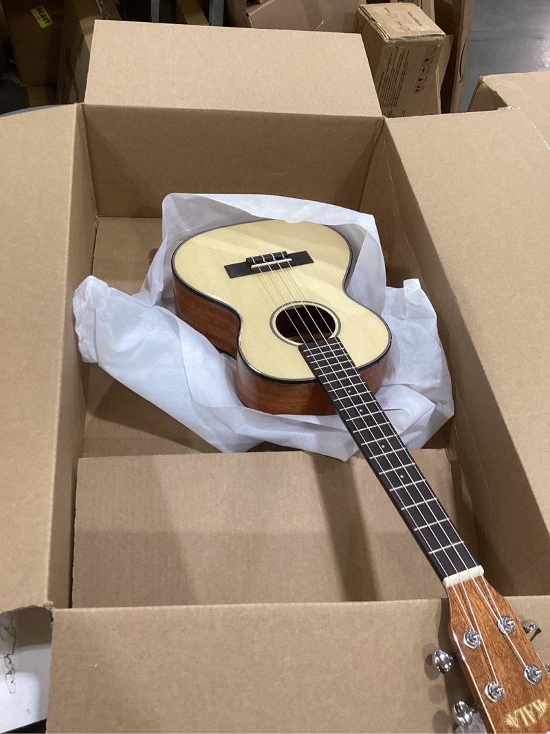Condition photo showing Good Condition for kala ka-stg tenor ukulele with solid spruce top and mahogany back and sides