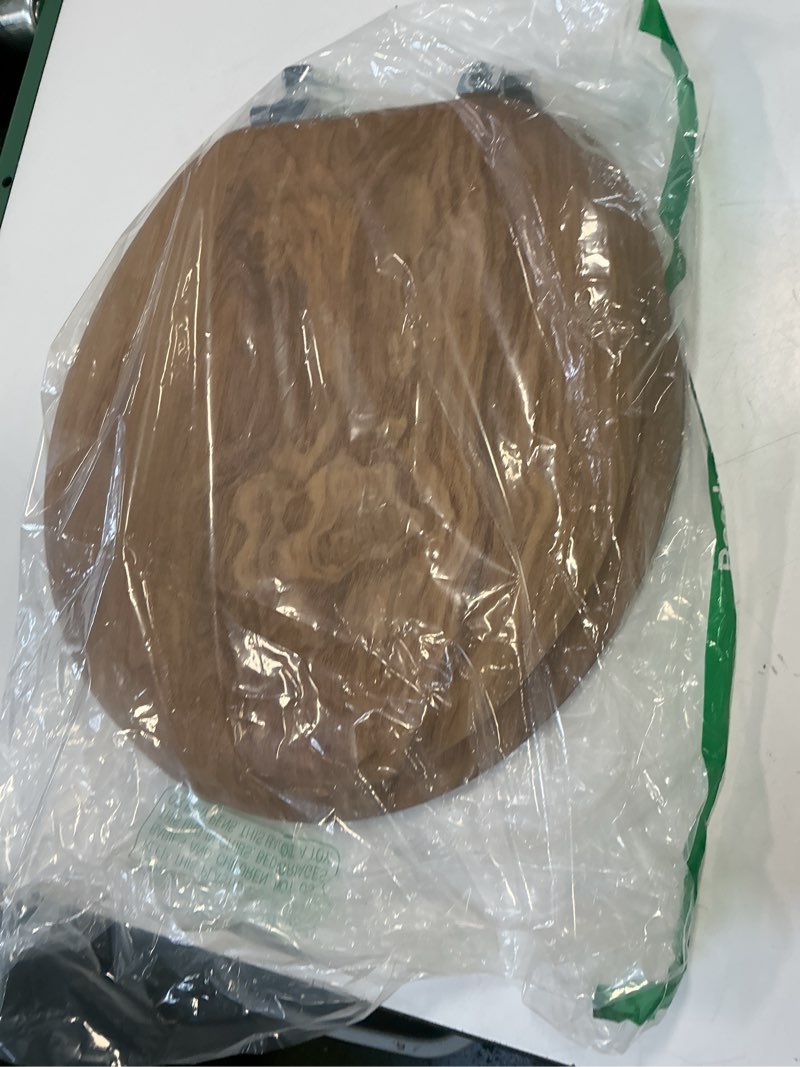 Condition photo showing As Is for Mayfair Natural Oak Veneer Toilet Seat with Chrome Hinges, Round, Wood