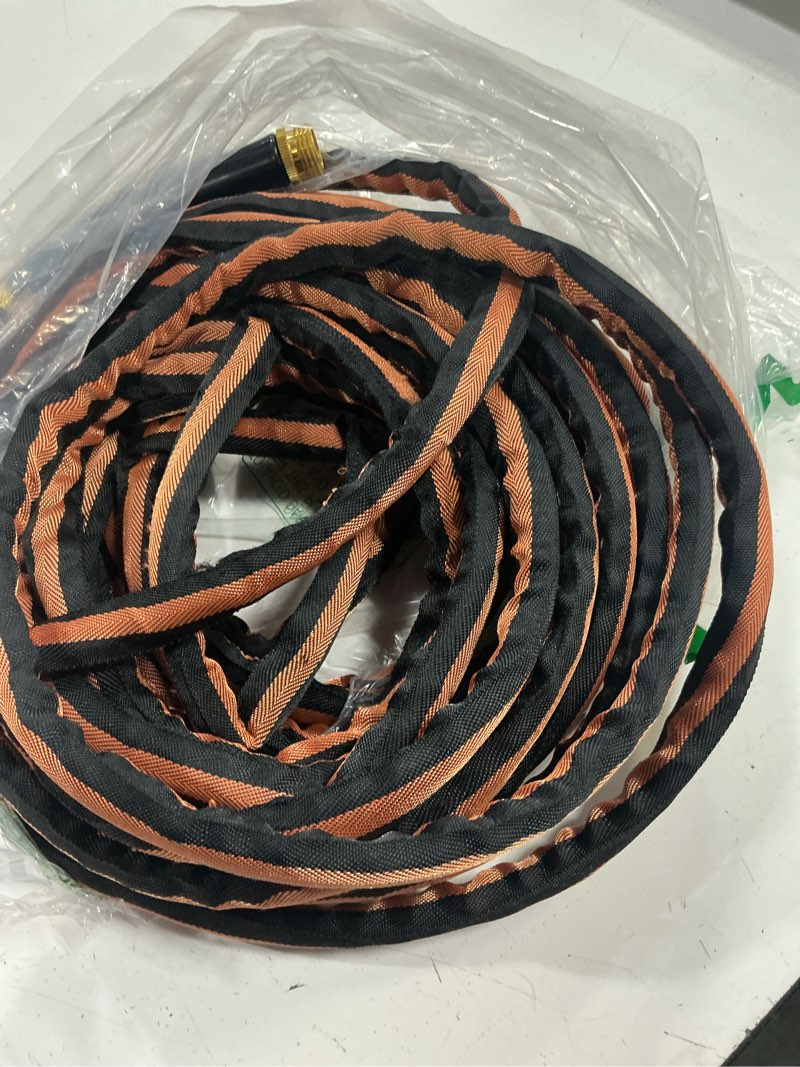 Condition photo showing Good Condition for garden hose 50ft 600 psi high pressure, flexible tpe water hose kink-free & lightweight, with abrasion-resistant cover for car washing, watering lawn, outdoor use 50ft orange