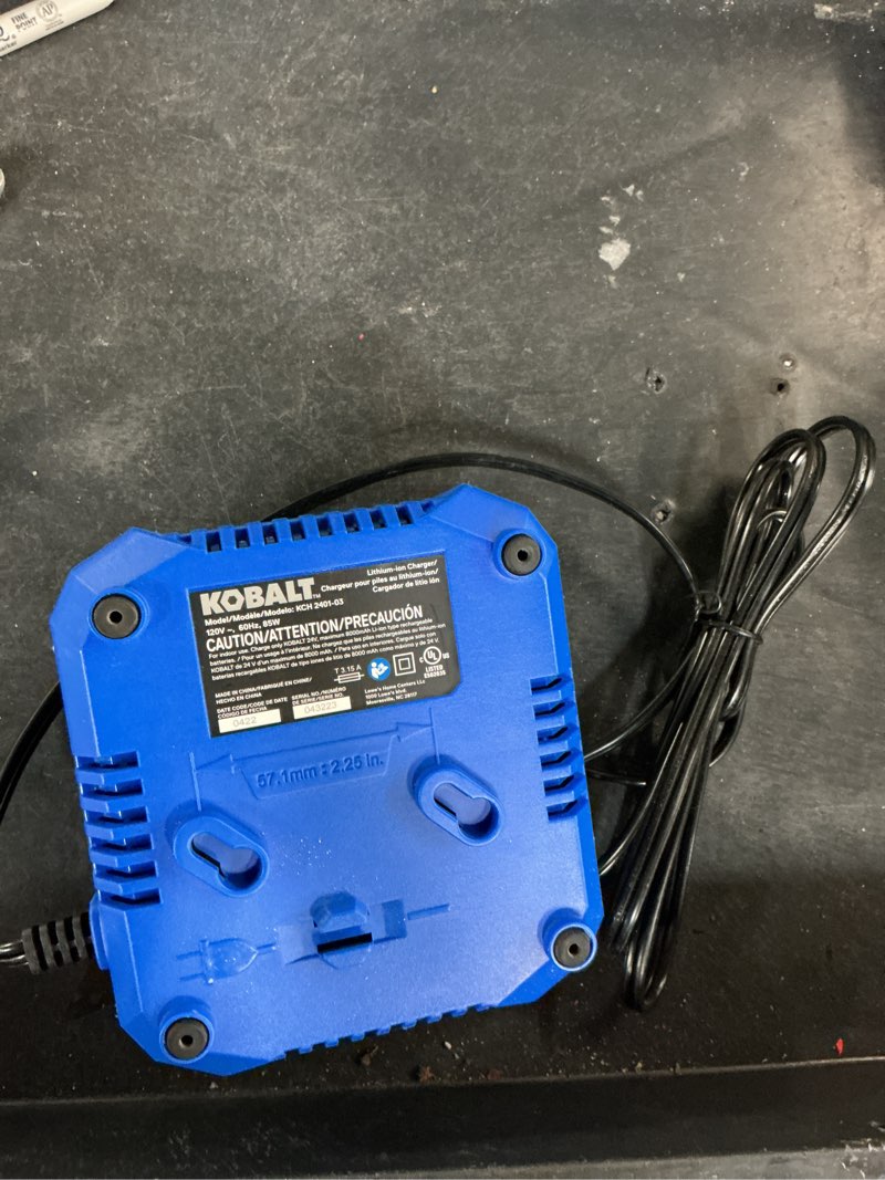 Condition photo showing As Is for kobalt 24 -volt battery charger ( lithium-ion )