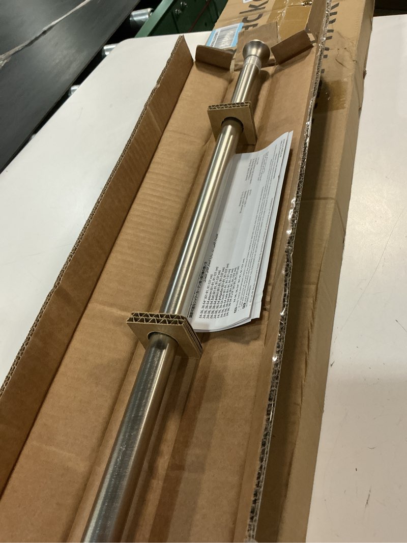 Condition photo showing Good Condition for amazon basics easy to install spring tension curtain rod, no drill, adjustable 24-36" width, nickel, classic finial, 7 pound weight capacity nickel 24-36" indoor