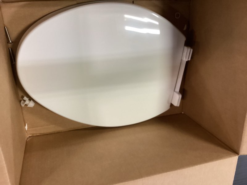 Condition photo showing As Is for Kohler K-20110-0 Brevia Elongated Toilet Seat with Grip-Tight Bumpers, Quiet-Close Seat, Quick-Attach Hardware, White