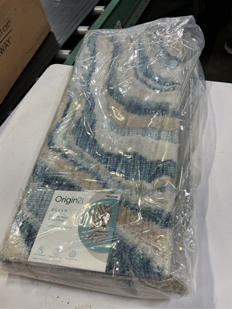 Condition photo showing New/Like New for origin 21 coastal tides 2 x 4 (ft) loomed polyester blue rectangular indoor geometric