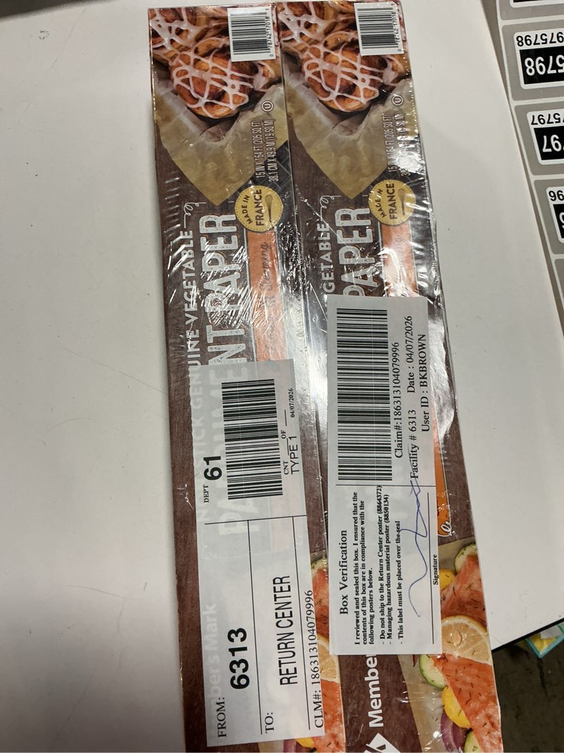 Condition photo showing New/Like New for member's mark parchment paper (205 sq. ft./roll, 2 rolls)