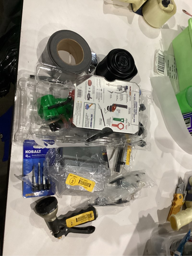 Condition photo showing As Is for assorted home improvement lot (small tools, screw, home accessories, etc.)
