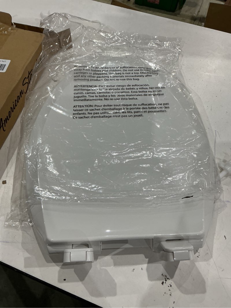 Condition photo showing Good Condition for american standard 5503a00b.020 transitional elongated toilet seat soft close, white elongated front