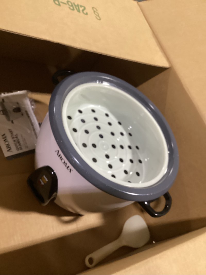 Condition photo showing As Is for aroma® rice cooker, 3-cup (uncooked) / 6-cup (cooked), small rice cooker, oatmeal cooker, soup maker, auto keep warm, 1.5 qt, white, arc-363ng 6 cup cooked / 3 cup uncooked / 1.5 qt. white