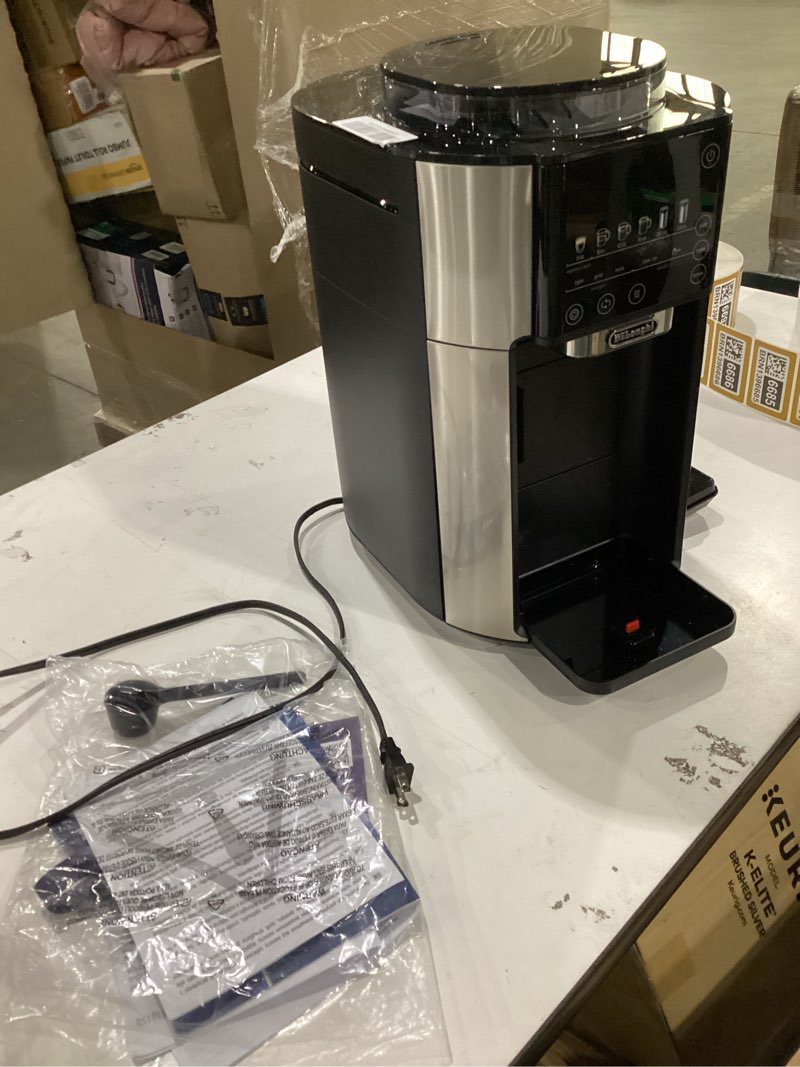 Condition photo showing As Is for de'longhi true brew drip coffee maker, built in grinder, single serve, 8 oz to 24 oz, hot or iced coffee, stainless, cam51025mb