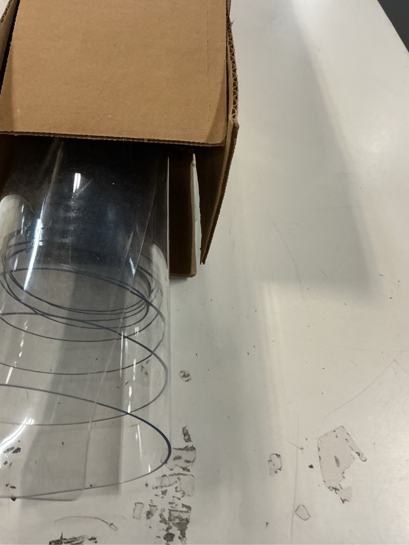 Condition photo showing As Is for Clear Table Protector 40 x 60 Inch, 1.5mm Thick Plastic Table Cover, Waterproof PVC Clear Table Cover Protector, Desk Protector Mat, Writing Desk Pad for Desktop, Coffee & Dining Room Table 40\" x 60\" (Rectangular) Crystal Clear ( similar