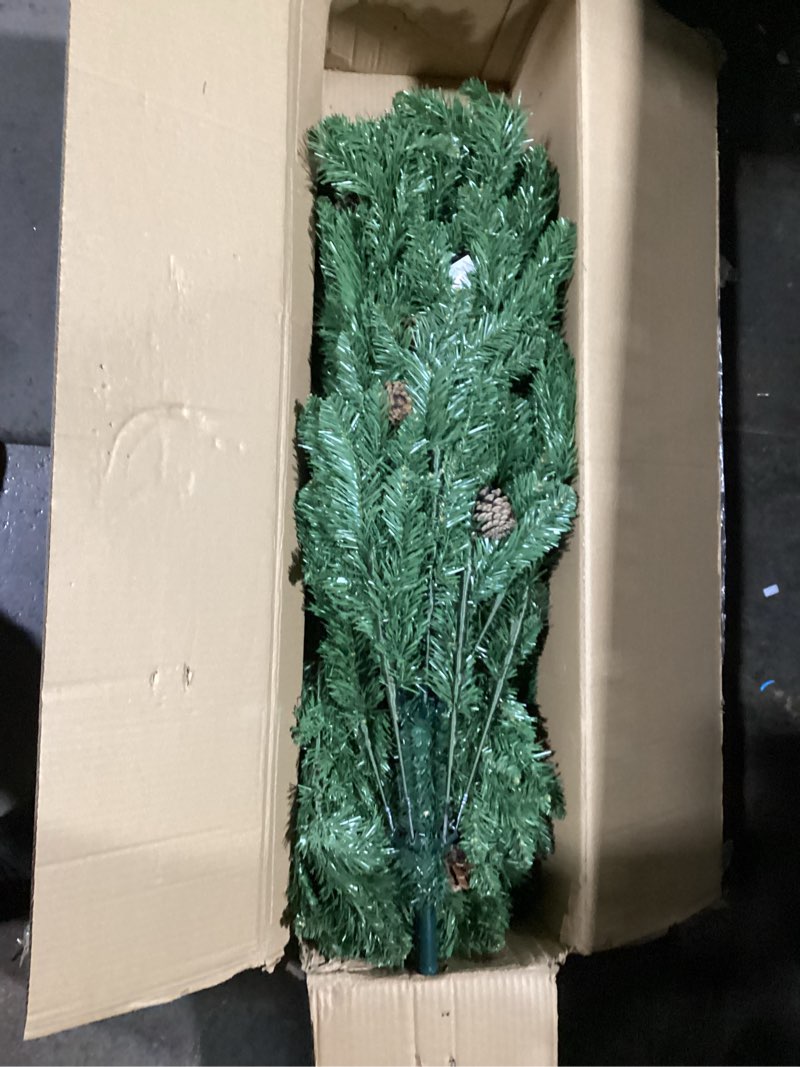 Condition photo showing New/Like New for Decoway 6FT Artificial Christmas Tree: Unlit Green Xmas Pine with Pinecones and Metal Stand for Indoor - Holiday Decoration for Porch Living Room Easy Assembly