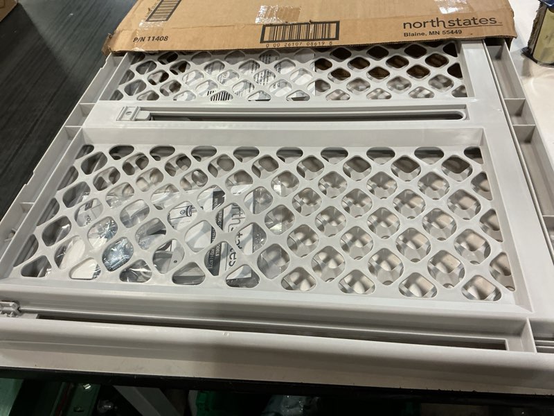 Condition photo showing Good Condition for mypet north states universal pet gate: 26” - 42” wide dog gate. use as pressure mounted gate or swinging door with included hardware. dog gates for doorways, 26" tall, gray