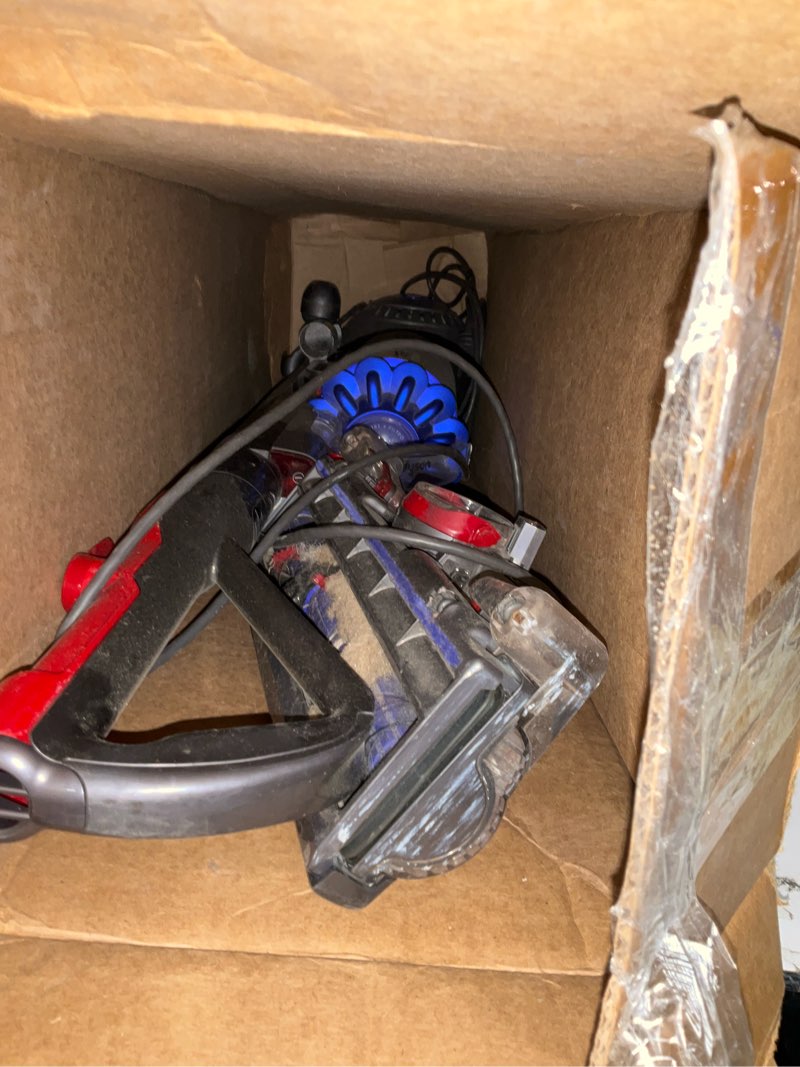 Condition photo showing As Is for vacuum