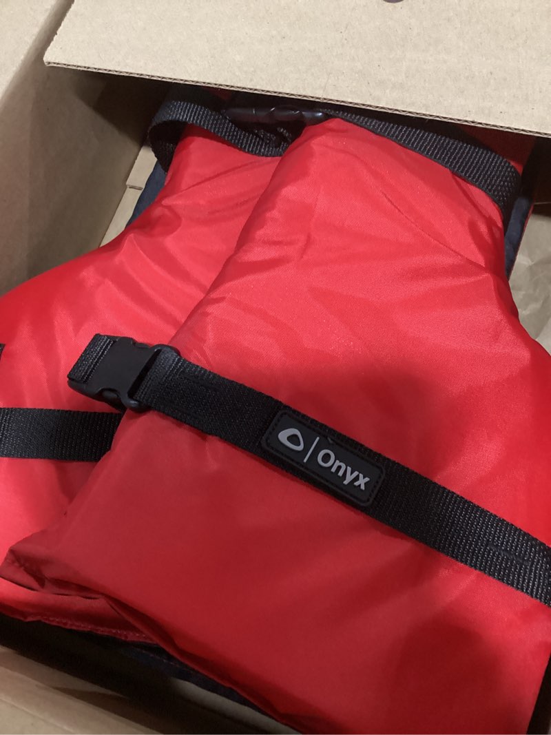 Condition photo showing As Is for onyx youth life jacket – coast guard approved, general purpose boating vest for kids, safety flotation device red