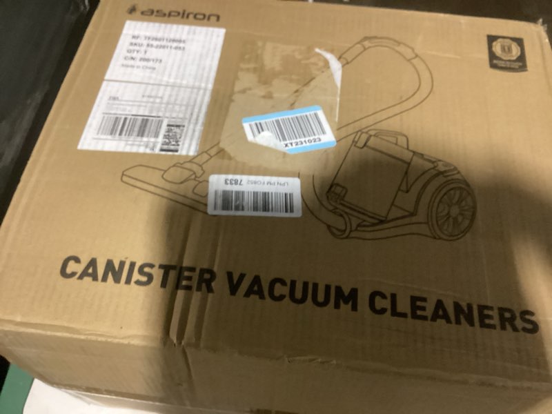Condition photo showing New/Like New for 1700w canister vacuum cleaner, 45kpa bagless vacuum cleaner, multi-cyclonic filtration, 2 anti-allergen hepa filters, 3.5qt dust cup, 4 tools, corded vacuum for hard floor, pet hair, turquoise