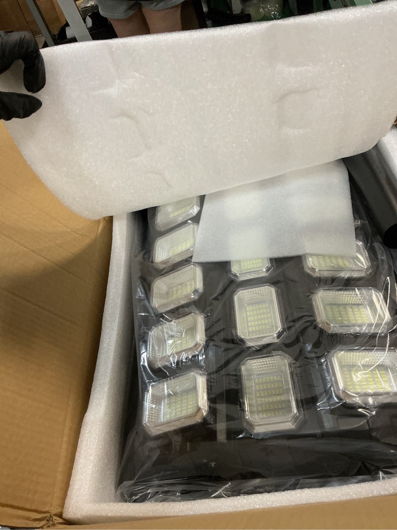 Condition photo showing New/Like New for 14000w solar street lights outdoor waterproof, solar powered led flood light outside, wide angle security parking lot light dusk to dawn, motion sensor, pole or wall mounted, remote control extra large light 1 pack