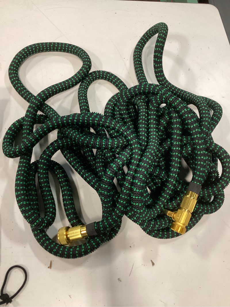 Condition photo showing Good Condition for 100 ft garden hose,2026 new improved lightweight all-weather water hoses, ultra durable and flexible garden hose with 10-function spray nozzle, leak-free connections garden hose for yard, lawn,outdoor blackgreen 100ft