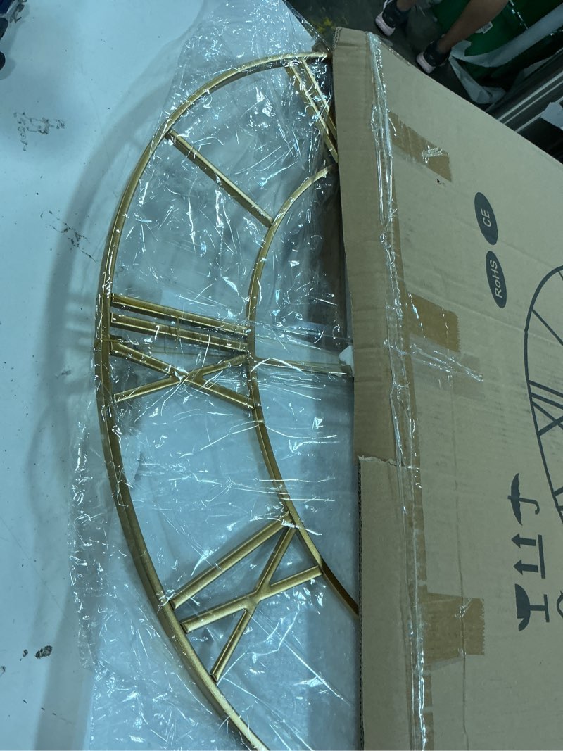 Condition photo showing Good Condition for LEIKE Large Modern Wall Clocks,32" Gold Metal,Rustic,Round,Nearly Silent,Little Ticking,Battery Operated Roman Numerals Clock for Living Room/Bedroom/Kitchen Wall Decor-(Gold, 80cm) 32 Inch Gold-roman Number