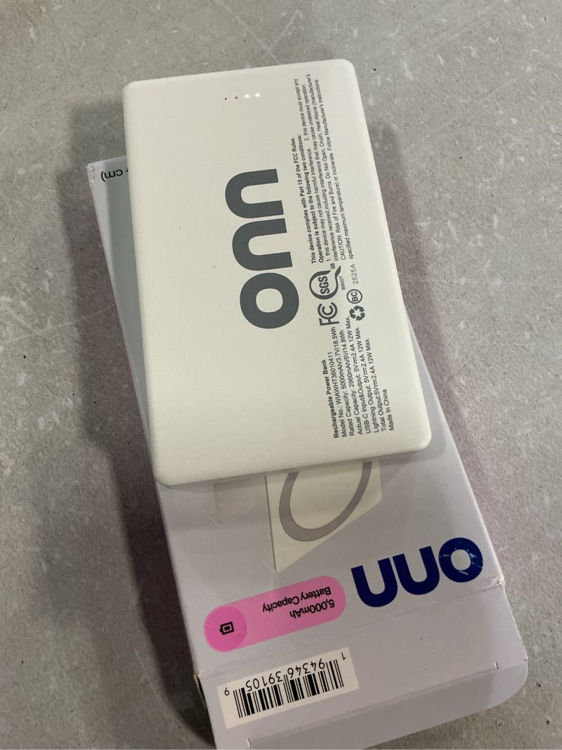 Condition photo showing Good Condition for onn 5,000 mah portable power bank with built in lightning cable, mfi certified, mag-attach ring, white - compatible with iphone 14/13/12/11/x/xr/xs/8/7/6/5, ipad, airpods and more (cable charge only)