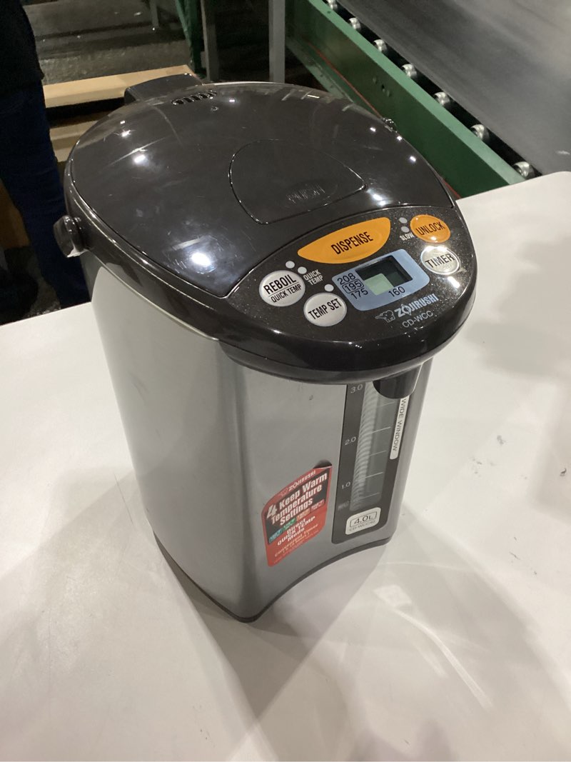 Condition photo showing As Is for *Not Tested* Missing power cord, Zojirushi Micom Water Boiler and Warmer (135 oz. / 4L, Silver) 4.2 Quarts Boiler