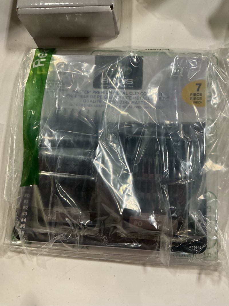 Condition photo showing New/Like New for Andis Master Series Premium Hair Clipper Attachment Comb Set, Clipper Guards Cutting Guides with Metal Clip, Black, 7 Count