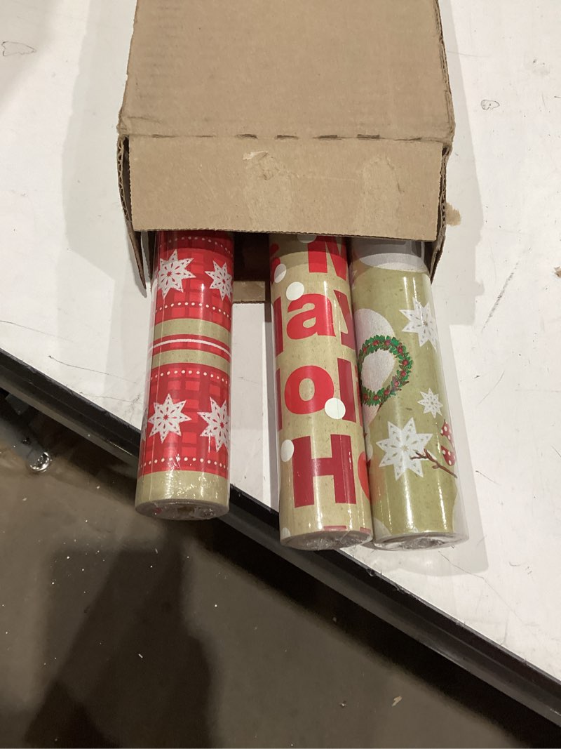 Condition photo showing New/Like New for hallmark reversible christmas wrapping paper (3 rolls: 120 sq. ft. ttl) merry holidays, snowflakes, snowmen, red stripes