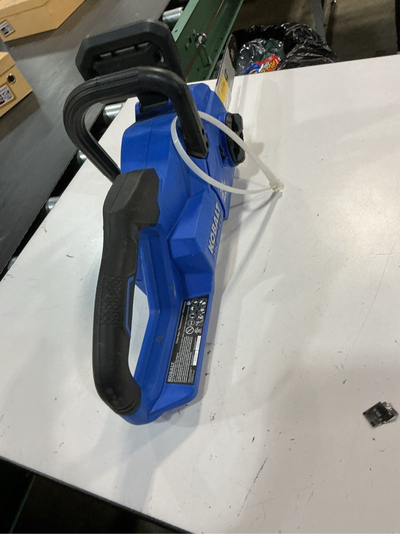 Condition photo showing As Is for (incomplete )kobalt 24-volt 12-in battery 4 ah chainsaw battery included charger included