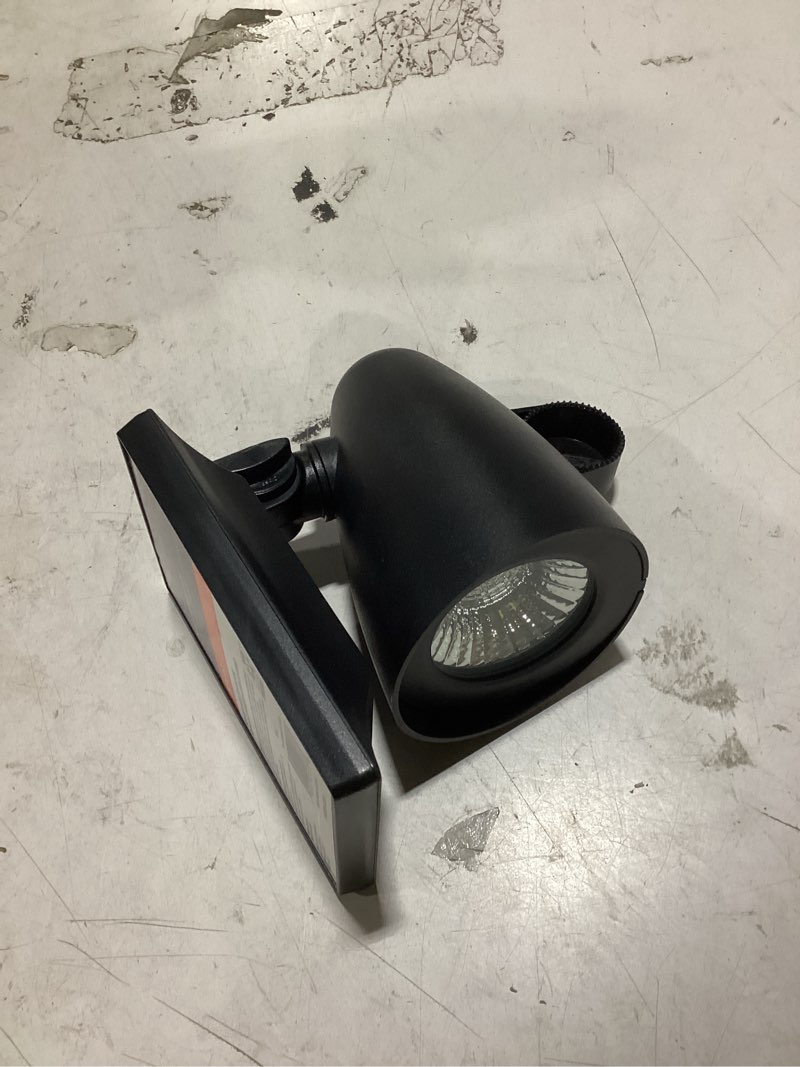 Condition photo showing As Is for (no spike)harbor breeze 60 -lumens 1 -watt black solar led spot light
