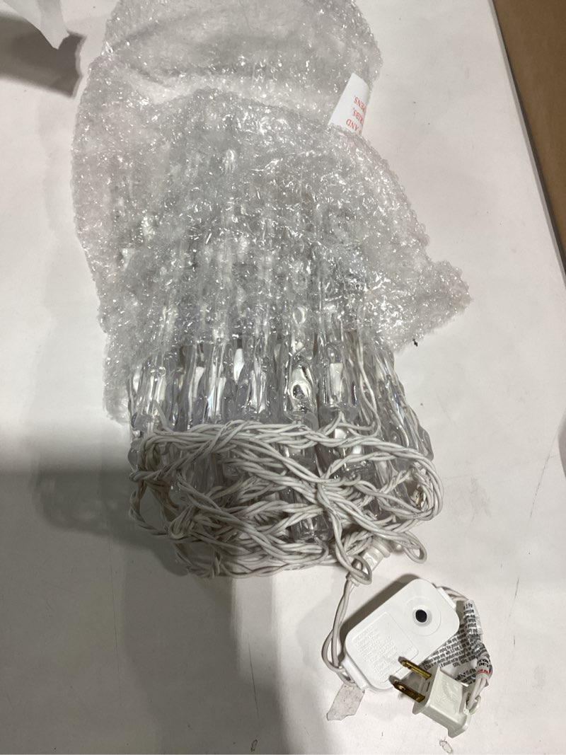 Condition photo showing Good Condition for brightown icicle lights for outside with remote, 30ft 150 led 30 tubes connectable ice shape hanging christmas lights for tree patio roof holiday decor, cool white cool white 30 tubes